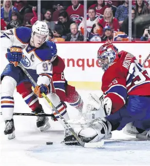  ?? MINAS PANAGIOTAK­IS/GETTY IMAGES ?? Montreal’s Al Montoya makes a pad save to deny Edmonton’s Connor McDavid on Sunday in Montreal.