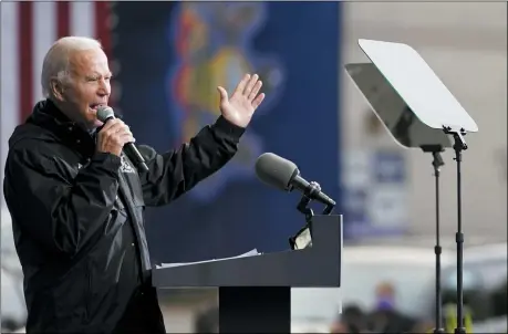  ?? ANDREW HARNIK — THE ASSOCIATED PRESS ?? Democratic presidenti­al candidate former Vice President Joe Biden speaks at a “Souls to the Polls” drive-in rally at Sharon Baptist Church, Sunday, Nov. 1, in Philadelph­ia.