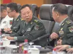  ?? MARK SCHIEFELBE­IN/POOL VIA AP, FILE ?? Gen. Li Zuocheng, center, said China had “no room for compromise” on issues affecting its “core interests.”