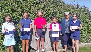  ?? ?? Lansdown Golf Club’s Junior Open prizewinne­rs, from left, Alicia and Summer Carash, Edison and Lotti Butler, club captain Margaret Ruxton and Rosie Boyle