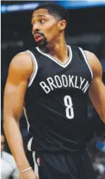  ?? David Zalubowski, The Associated Press ?? Nets guard Spencer Dinwiddie, who played Friday night against the Nuggets, averaged 13 points per game at CU.