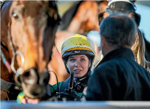  ?? JOSEPH JOHNSON/STUFF ?? Kate Cowan shares a special moment with her father Snooky following her Winter Cup win.