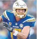  ?? PETER B JONELEIT THE ASSOCIATED PRESS ?? A loss to Baltimore two weeks ago ultimately put Philip Rivers and the Chargers on the road for the playoffs.