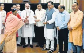  ??  ?? BJP MPS from the North-east meet PM Narendra Modi to submit a memorandum on various issues pertaining to the region, including the Assam-mizoram border row, in New Delhi on Monday.