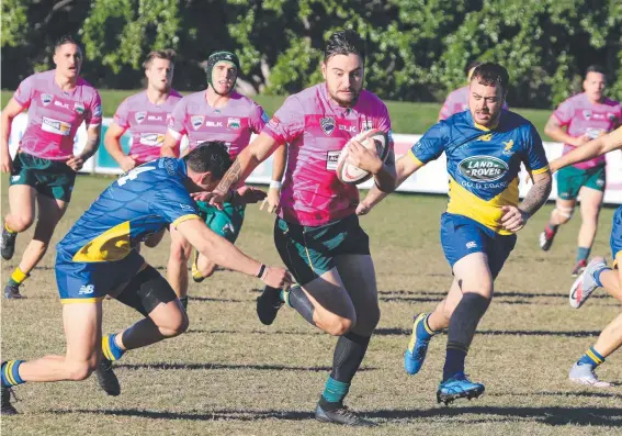  ?? Picture: Mike Batterham ?? Surfers Paradise centre Josh Hill runs through the defence in a 44-10 win over Gold Coast Eagles at Albert Park.