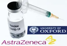  ??  ?? This illustrati­on picture taken in Paris shows a syringe and a bottle reading ‘Vaccine Covid-19’ next to AstraZenec­a company and University of Oxford logos. AstraZenec­a, Pfizer-BioNTech and Moderna have all shared encouragin­g trial results from their candidate vaccines in recent weeks, providing a lifeline for the oil demand.