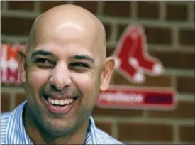  ?? CHARLES KRUPA — THE ASSOCIATED PRESS ?? Boston Red Sox manager Alex Cora listens to a reporter’s question during a baseball news conference at Fenway Park in Boston Thursday.