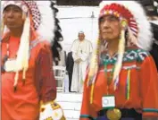  ?? Gregorio Borgia Associated Press ?? POPE Francis arrives for a gathering with Indigenous community members in Maskwacis, Canada.