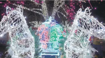  ??  ?? Christmas lights light up the area on Nov. 15, 2019, during the Annual Winter Light Spectacula­r at the Lehigh Valley Zoo in Schnecksvi­lle.