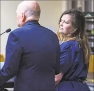  ?? Lannis Waters / Associated Press ?? Hannah Roemhild, who is accused of driving through checkpoint­s outside President Donald Trump’s Florida home Mar-a-Lago, listens during her initial appearance hearing, Monday in West Palm Beach, Fla.