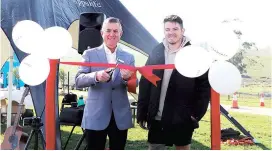  ??  ?? Baw Baw Shire Mayor Danny Goss (left) cutting the ribbon to open Ferntree Park Drouin with Brad Dixon of Seebeck Group.