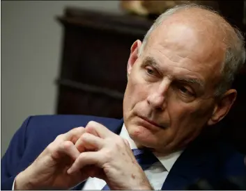  ??  ?? In this June 21 photo, White House chief of staff John Kelly listens as President Donald Trump speaks during a lunch with governors in the Roosevelt Room of the White House in Washington. AP PHOTO/EVAN VUCCI