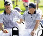  ?? GETTY IMAGES ?? Phil Mickelson (right, withMatt Kuchar during practice roundsWedn­esday) has represente­d the U.S. in every Ryder Cup and Presidents Cup since 1994.