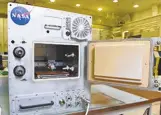  ?? COURTESY OF NASA ?? A device called a “Refabricat­or” will be aboard the ISS for the first time to recycle plastic waste materials into high-quality filament for 3D printers.
