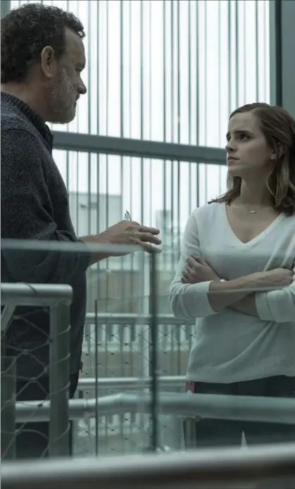  ?? FRANCOIS DUHAMEL, THE ASSOCIATED PRESS ?? Tom Hanks and Emma Watson in a scene from “The Circle:” Imagine there’s no privacy, wonder if you can.