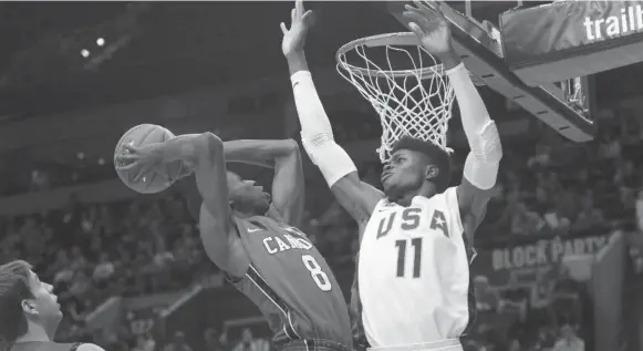  ?? ROSS WILLIAM HAMILTON/THE OREGONIAN ?? Andrew Wiggins of the Canadian junior men’s squad goes up for a shot against a U.S. opponent last year. Wiggins is widely considered the best 17-year-old player Canada has ever produced.