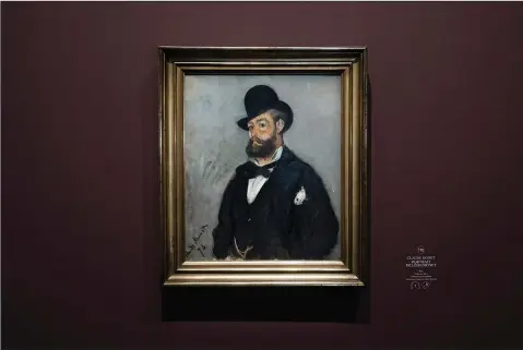  ?? (AP/Lewis Joly) life and art ?? A portrait of Leon Monet by his brother Claude Monet hangs on display Monday as part of an exhibition illuminati­ng the role Leon played in his brother’s at the Musee du Luxembourg in Paris.