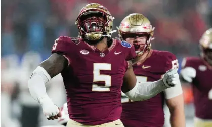  ?? ?? Florida State will not play in the College Football Playoff despite going 13-0 this season. Photograph: Jim Dedmon/USA Today Sports