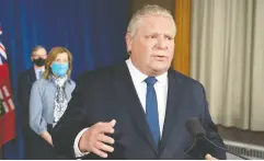  ?? Frank Gunn / the Cana dian press ?? Premier Doug Ford speaks at Queen’s Park in Toronto on Tuesday, announcing a state of emergency and stay-at-home order for the province of Ontario.