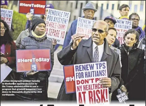  ??  ?? Haitian immigrants protest Tuesday in Manhattan against decision by the Trump administra­tion to end a program that granted temporary residency to thousands displaced by 2010 earthquake.