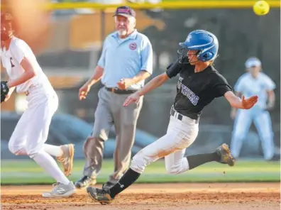  ?? STAFF PHOTO BY ERIN O. SMITH ?? Sale Creek’s Hannah Hall steals second base against Tellico Plains in their softball game Monday. Sale Creek defeated Tellico Plains 7-3 in the winners-bracket final in the District 4-A tournament at Lookout Valley.