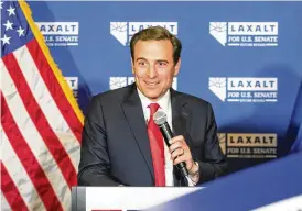  ?? TOM R. SMEDES / ASSOCIATED PRESS ?? Nevada Republican U.S. Senate candidate Adam Laxalt celebrates his victory with family, friends and supporters at the Tamarack Casino in Reno on Tuesday.