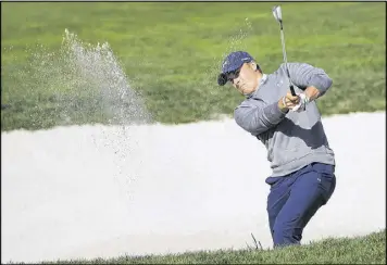  ?? AP ?? Leader Jordan Spieth plays from the fairway bunker on No. 6 during Saturday’s third round of the Pebble Beach National Pro-Am. Brandt Snedeker is a distant second.