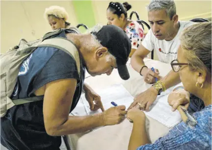  ?? (Photo: AFP) ?? HAVANA, Cuba — A man votes at a polling station during the new Family Code referendum in Havana on September 25, 2022. Cubans voted in a landmark referendum on whether to legalise same-sex marriage and adoption, allow surrogate pregnancie­s, and give greater rights to non-biological parents.