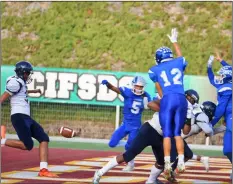  ?? PHOTO AARON BODUS ?? Joseph Tarango and Michael Sullivan attack a punt during Saturday’s CIF-SDS Division III championsh­ip game at Southweste­rn College in Chula Vista. Tarango’s clean block of this punt would result in a safety for Central.