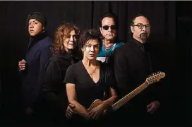  ?? CONTRIBUTE­D ?? The original members of the Revolution, including Mark “Brownmark” Brown (far left) on bass, are back on tour and will play the Tabernacle on Feb. 24.