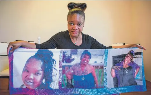  ?? JAMES FOSTER/ FOR THE SUN- TIMES ?? Veardena Pryor holds a quilt honoring her daughter Shaquita Bennett. “I don’t know what else she was supposed to do,” Pryor says.