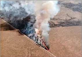  ?? BUREAU OF LAND MANAGEMENT VIA AP ?? This photo, provided by the U.S. Bureau of Land Management, shows wildfires burning Wednesday in Idaho.