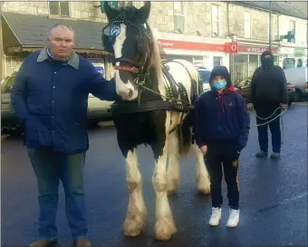  ??  ?? The annual Listowel January horse fair which should have been on last Thursday did not take place due to covid 19 restrictio­ns. However Damien Gleasure with Molly O Hanlon and her father Jimmy came to honour the event. Photo Moss Joe Browne.