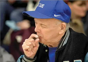  ?? David Carson/St. Louis Post-Dispatch/TNS ?? Charles Tabor plays the Notre Dame High School fight song on his kazoo at halftime during a junior varsity basketball game Dec. 5, 2017, at Notre Dame . Tabor, a 77-yearold blind man, began attending events at the school 20 years ago and is now regular...