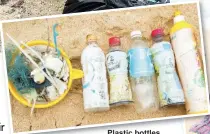  ??  ?? Plastic bottles from Thailand and Vietnam were among the rubbish collected during the beach clean-up.