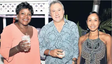  ??  ?? Metry Seaga and his wife Nadine (right) joined by Charmaine Deane.