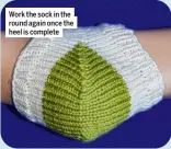  ?? ?? Work the sock in the round again once the heel is complete