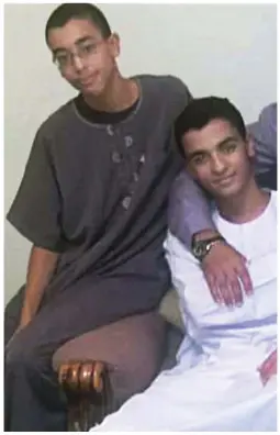  ??  ?? ‘In training’: Hashem Abedi holding a machine gun. Above: Hashem with his brother Ismail