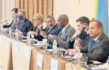  ?? EFREM LUKATSKY/AP ?? A United States congressio­nal delegation led by Rep. Gregory Meeks, D-N.Y., third right, chairman of the House Foreign Affairs Committee, gives a briefing Friday after meeting with Ukrainian President Volodymyr Zelenskyy in Kyiv.