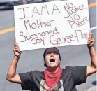  ?? STEVE SCHAEFER/ ATLANTA JOURNAL-CONSTITUTI­ON VIA AP ?? Protesters gather outside an Atlanta Wendy’s where Rayshard Brooks was shot and killed Friday.