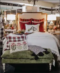  ?? (TNS/Handout) ?? For those who like to keep their duvet consistent through the changing of the seasons, plaid accents are a great way to bring a touch of holiday to your space.