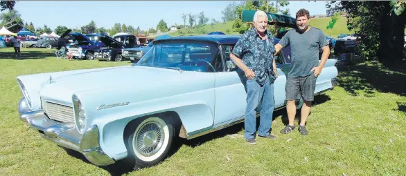  ?? ALYN EDWARDS ?? Arlen and Stellard McConnell display the 1958 Continenta­l Mark III that was not driven since being parked after bringing baby Stellard home from the hospital 53 years ago.