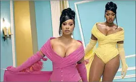  ?? Atlantic Records / YouTube ?? “WAP,” in still from the song’s video, with Cardi B, left, and Megan Thee Stallion.