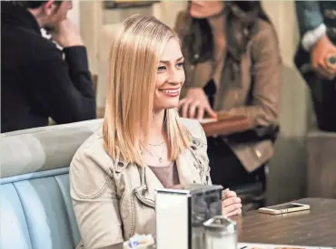  ?? WARNER BROS. ?? Beth Behrs stars as Caroline Channing in CBS Television Network’s “Two Broke Girls.”