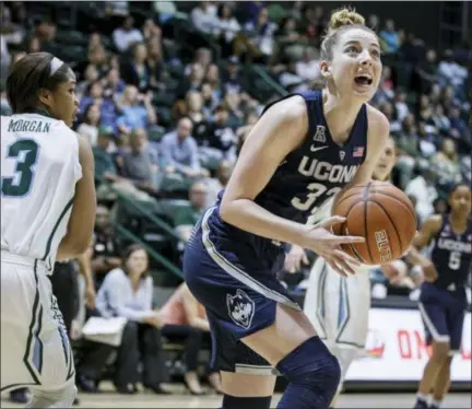  ?? SOPHIA GERMER — THE ASSOCIATED PRESS ?? UConn guard/forward Katie Lou Samuelson (33) goes to the basket during the first half of the Huskies’ win over Tulane Saturday.