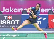  ??  ?? Saina in action against Fitriani on Saturday.