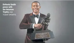  ?? USA TODAY SPORTS ?? DeVonta Smith poses with the Heisman Trophy.