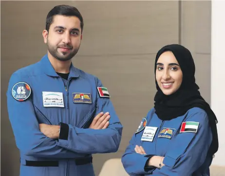  ?? Chris Whiteoak / The National ?? Emirati astronauts Nora Al Matrooshi and Mohammed Al Mulla in Dubai yesterday