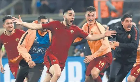  ?? AFP ?? Kostas Manolas (centre) celebrates after scoring the winners in Roma’s secondleg Champions League quarterfin­al against Barcelona at the Olympic Stadium on Tuesday.