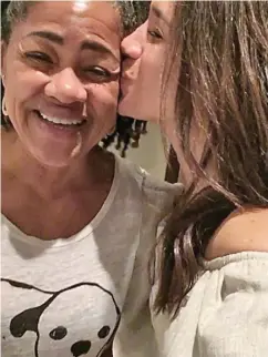  ??  ?? Close: Meghan Markle and her mother Doria